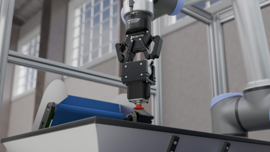 Industrieller Roboterarm mit einem Vakuumgreifer, der ein Bauteil mit einem Saugnapf anhebt – eine moderne Automatisierungslösung für präzises Materialhandling.